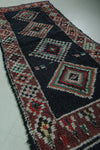 Red and black runner rug 3.5 X 9 Feet