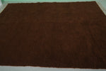 Cozy Moroccan Rug - 6.9 x 9.8 ft | Deep Brown Shag with Fringe