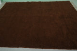 Cozy Moroccan Rug - 6.9 x 9.8 ft | Deep Brown Shag with Fringe