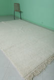 Moroccan Rug 6.7 x 10.1 ft - Handwoven Wool in Creamy Ivory