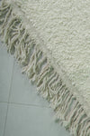 Minimalist Moroccan Rug - 6.7 x 9.8 ft | Soft White with Fringe