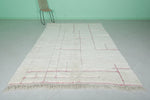 Elegant Moroccan Rug - 6.7 x 9.3 ft | White with Red Linear Accents