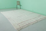 Elegant Moroccan Rug - 6.7 x 9.3 ft | White with Red Linear Accents