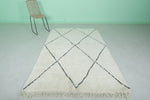 Authentic Moroccan Rug - 5.5 x 7.7 ft | White with Black Diamond Pattern