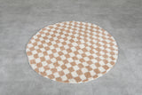 Round moroccan rug - feet beige rug