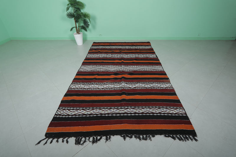 Moroccan Rug - Black, Orange, and White Striped Design - 5.5x9.6 ft