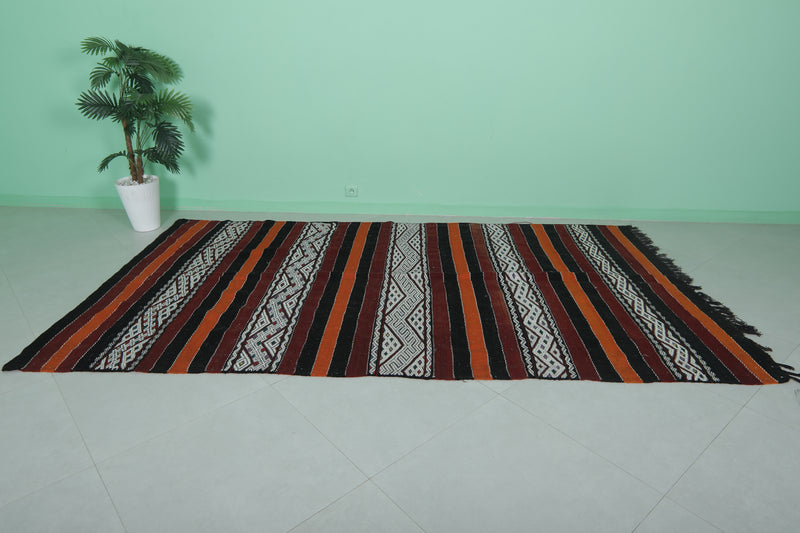 Moroccan Rug - Black, Orange, and White Striped Design - 5.5x9.6 ft