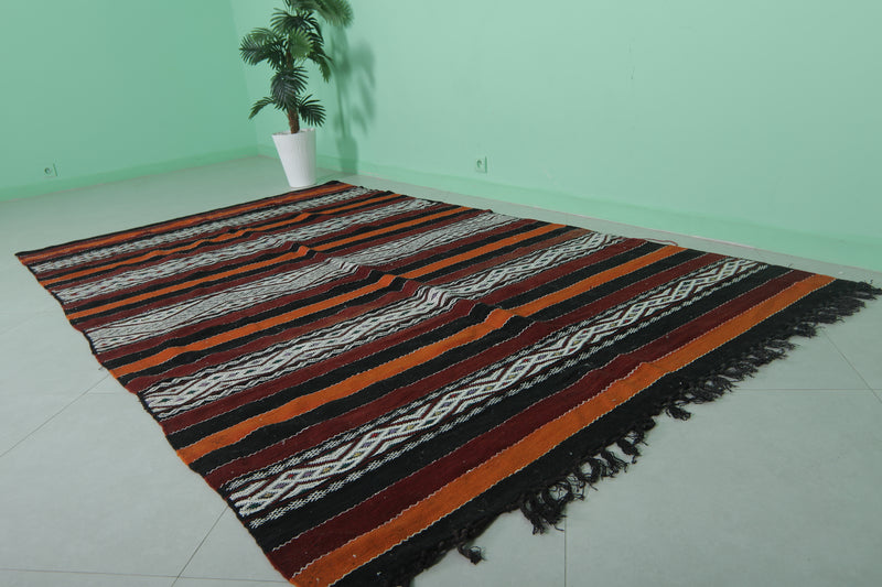 Moroccan Rug - Black, Orange, and White Striped Design - 5.5x9.6 ft