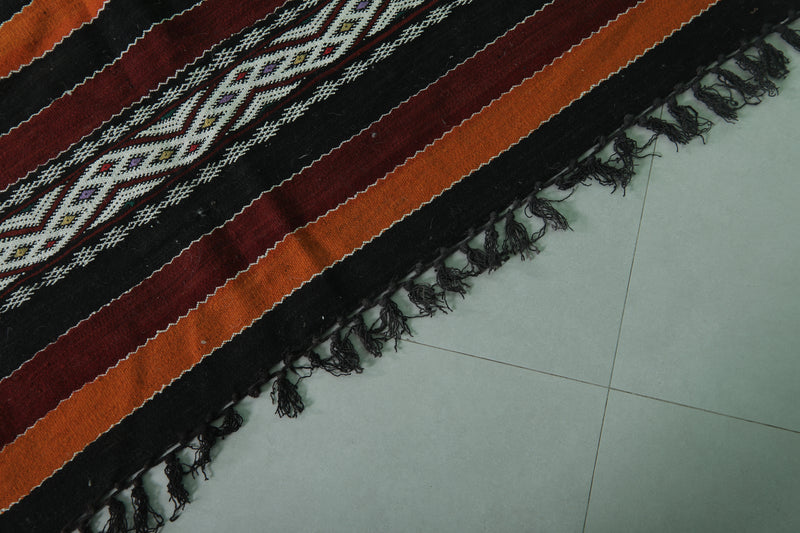 Moroccan Rug - Black, Orange, and White Striped Design - 5.5x9.6 ft