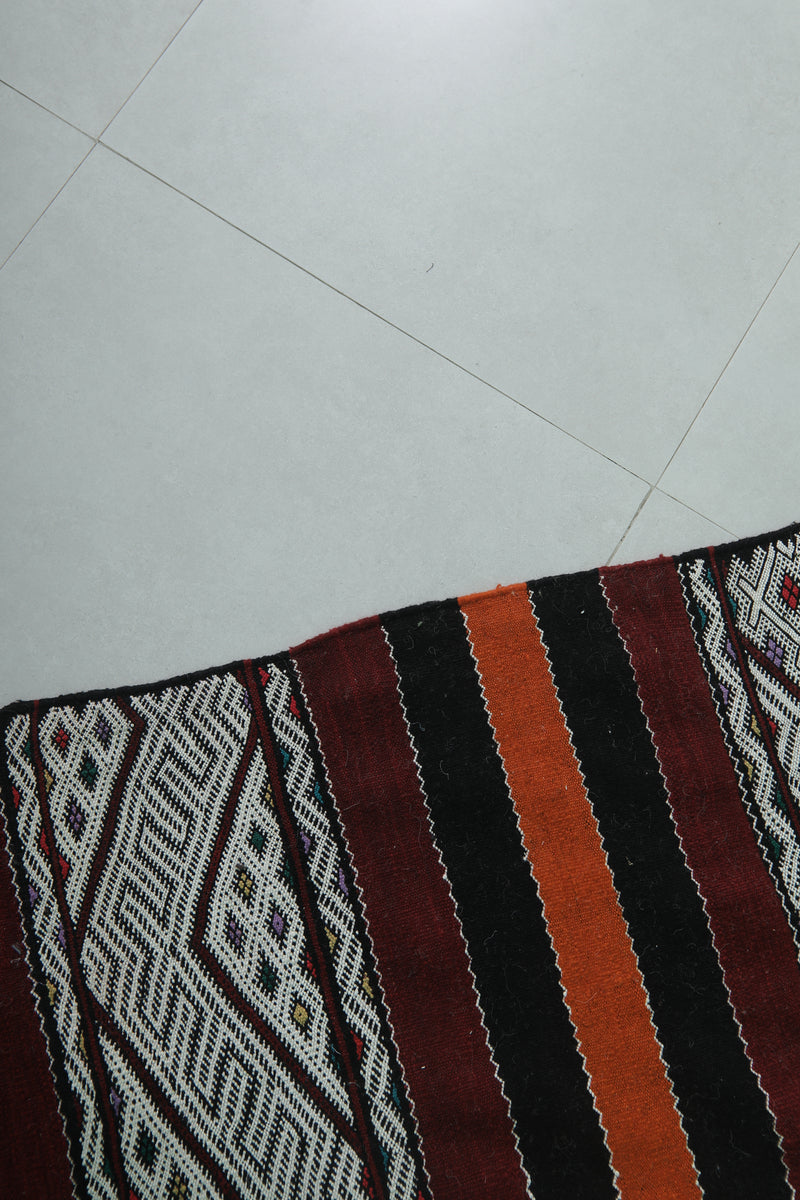 Moroccan Rug - Black, Orange, and White Striped Design - 5.5x9.6 ft