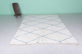 Diamond Moroccan Wool Rug - 6.4 FT X 9.9 FT | Ivory with Blue Accent Design