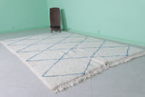 Diamond Moroccan Wool Rug - 6.4 FT X 9.9 FT | Ivory with Blue Accent Design