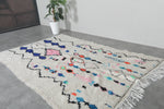 Colorful Moroccan rug 5.1 FT × 7.8 FT