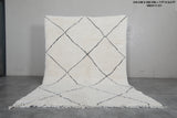 Classic Moroccan Rug - 7 x 9.5 ft | White with Black Diamond Pattern